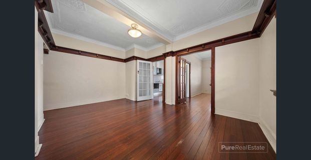 Top-Floor Art Deco Charm Meets Modern Convenience - Photo 1