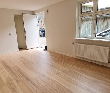 Skøn, renoveret lejlighed i centrum - Photo 2