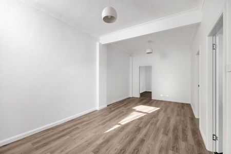 Renovated Three-Bedroom Unit in Commercial Precinct - Photo 2