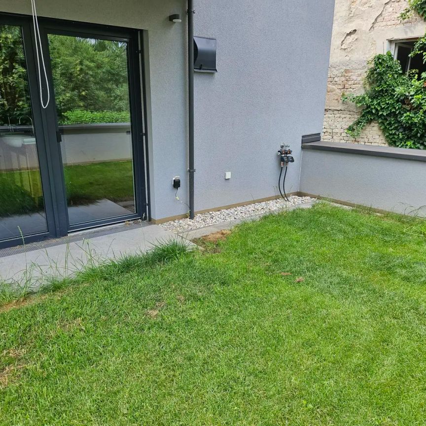 MODERNE 4 ZIMMER GARTENWOHNUNG MIT TG-STELLPLÄTZEN - Foto 1