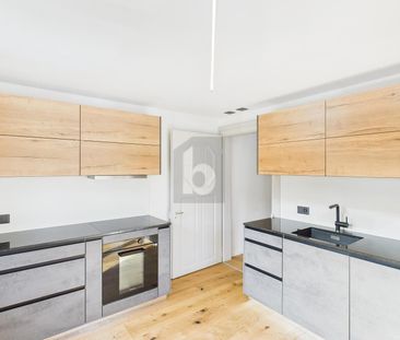 GENEROUS AND NEWLY RENOVATED - Photo 3