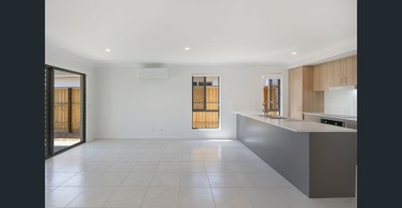 A modern sanctuary in a peaceful, family-friendly pocket, this beautifully finished 4-bedroom home delivers effortless living with a touch of luxury. - Photo 5