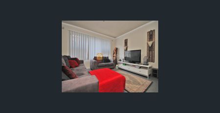 Front facing, 2 bedroom residence with a lock up garage - Photo 2