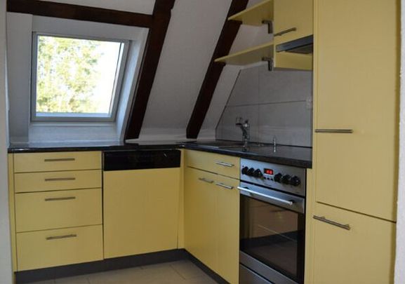 Charming 2-room city apartment with its own roof terrace! - Photo 1