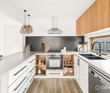 Impeccably Renovated 3-Bedroom Haven with Expansive Outdoor Living - Photo 3