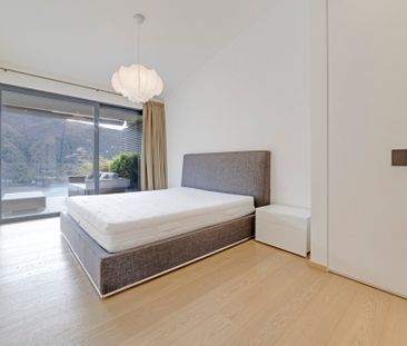 ELEGANTE APPARTAMENTO DI 4.5 LOCALI CON GIARDINO E VISTA LAGO - Photo 2