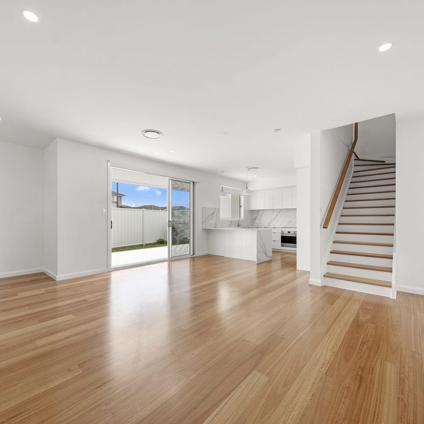 APEX PORTRAIT: Brand New Home in Enviable Blue Bay Locale - Photo 1