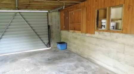 Elevated Three Bedroom Home with Garage and Outdoor Living - Photo 3