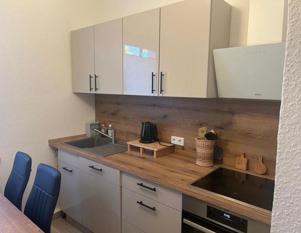 Tolle 2-Raum-Wohnung im Erdgeschoß mit Balkon - Photo 1