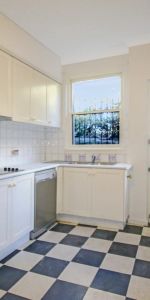 Charming Family Apartment in Convenient Location - Photo 4