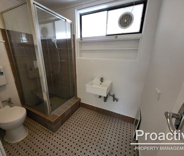 Stylish & Low-Maintenance Apartment Living in a Convenient Location - Photo 5