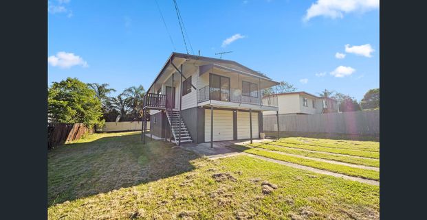 Renovated Family Home with Spacious Yard and ample storage - Photo 1