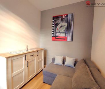 Pięknie urządzone 2-pokojowe mieszkanie w centrum - Фото 1