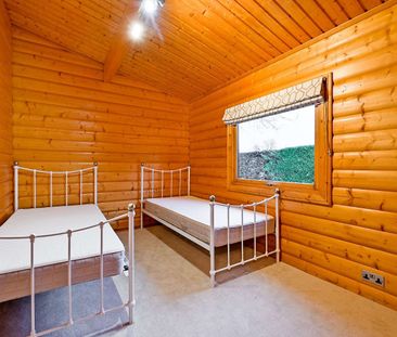 A private two bedroom lodge located in a walled garden on the Harle... - Photo 4