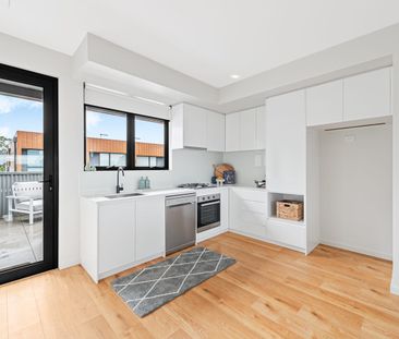 Modern Double-Storey Townhouse with Reverse Living Design - Photo 1