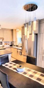5 1/2 avec deux salons sur deux étages, luxueux, cour privé a voir. disponible 15 juin ou 1 Juillet - Photo 3