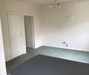 Charming 1BR Unit with Sunroom & Garden - Photo 1