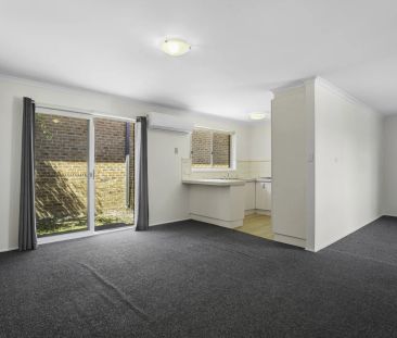 Comfortable & Well-Laid-Out 3-Bedroom Home with Versatile Living Sp... - Photo 1