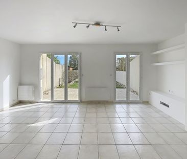 Location Maison 4 pièces 79m² PUILBOREAU 17138 - Photo 2