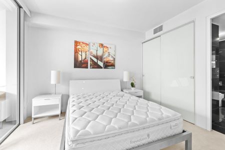 Partly Furnished Unit in Water's Edge complex - Photo 4