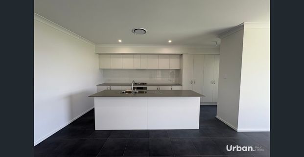 Four Bedroom Home with Extra Large Living Areas! - Photo 1