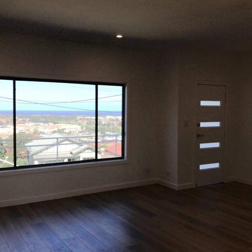 FULLY RENOVATED WITH NOTHING LEFT OUT!! - Photo 1