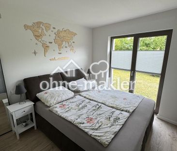 Stilvolle 3-Zimmer-EG-Wohnung mit großer Terrasse und Garten - Photo 6