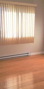 N-Rosemont Grand 4 1/2 Triplex 2e Étage près de tous les services - Photo 4