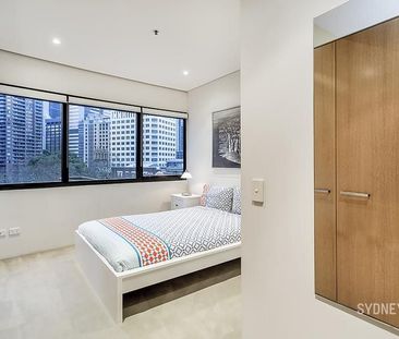 FABULOUS ONE BEDROOM IN SEIDLER’S COVE WITH CITY VIEWS | Furnished - Photo 4