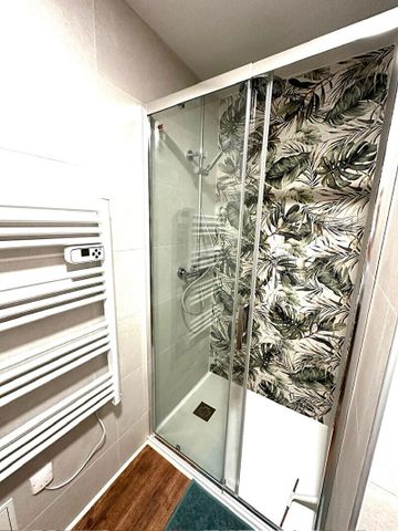 A LOUER TRES BEL APPARTEMENT MEUBLE EN PLEIN CENTRE VILLE DE ST QUENTIN 02100 - Photo 2