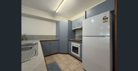 Townhouse Amongst It All! - Photo 2