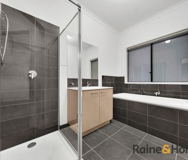 Stylish 4-Bedroom Family Home + Study | Prime Cranbourne East Location - Photo 1