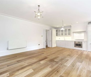 A stunning three bedroom, two bathroom apartment offering over 1,400 sq ft of living space. - Photo 1