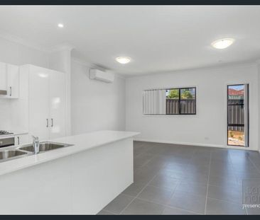 PRIVATE & LOW-MAINTENANCE TOWNHOUSE LIVING IN WARATAH - Photo 3