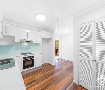 FULLY RENOVATED FAMILY HOME WITH DECKING - Photo 1