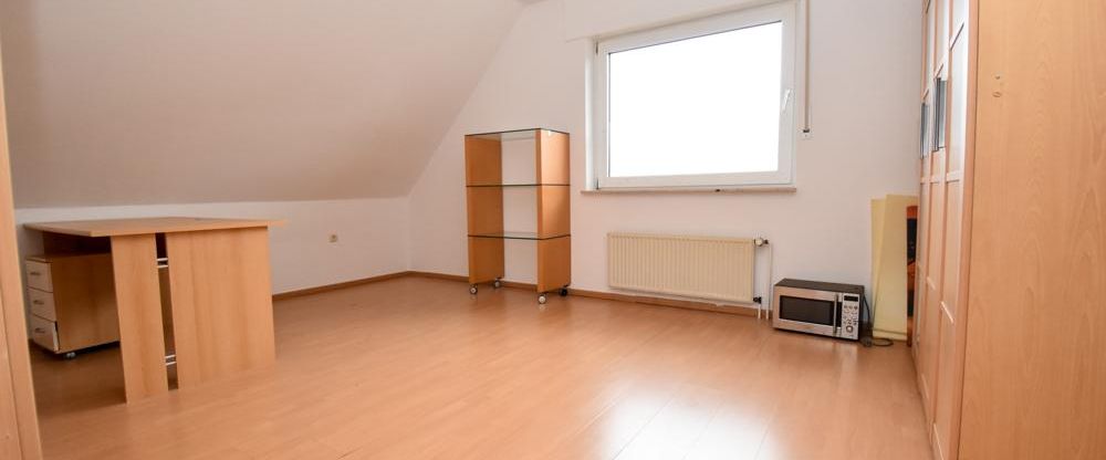 Dachgeschoswohnung mit Garage in ruhiger Siedlungslage in Markhausen - Foto 1