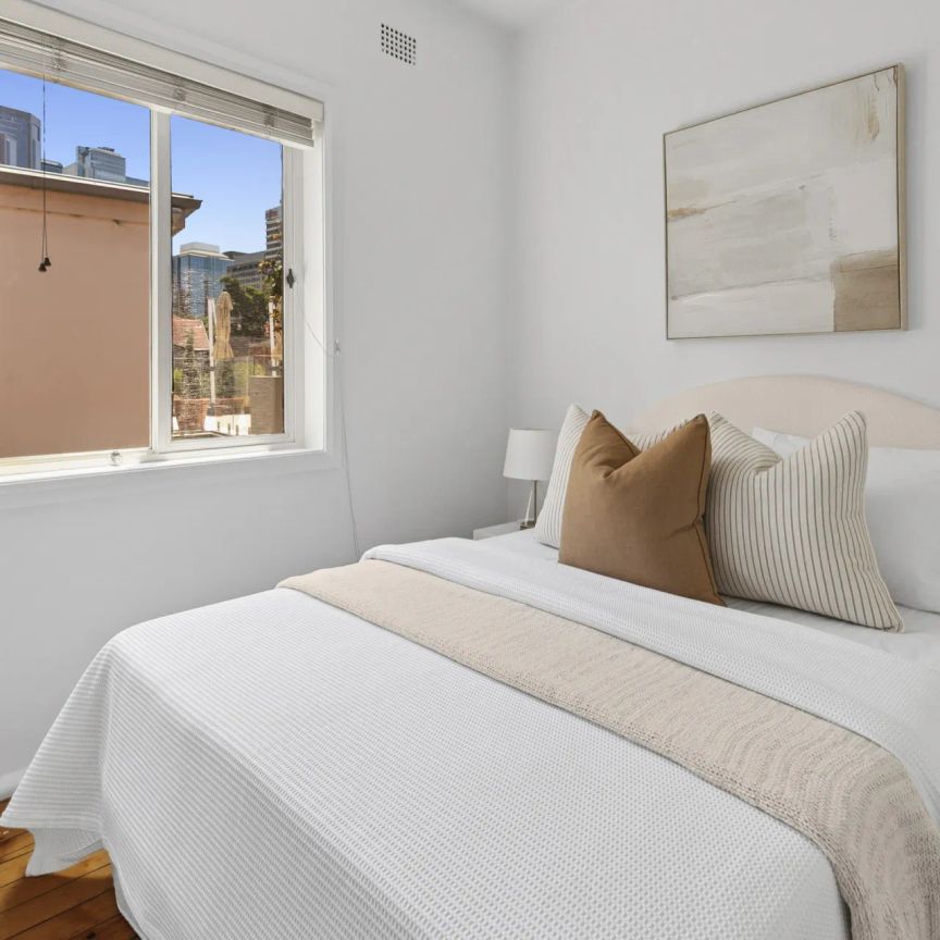 Bright north-facing apartment in exclusive village setting - Photo 1