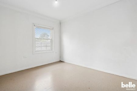 Comfortable 3-Bedroom Home with Spacious Yard in a Convenient Location - Photo 2