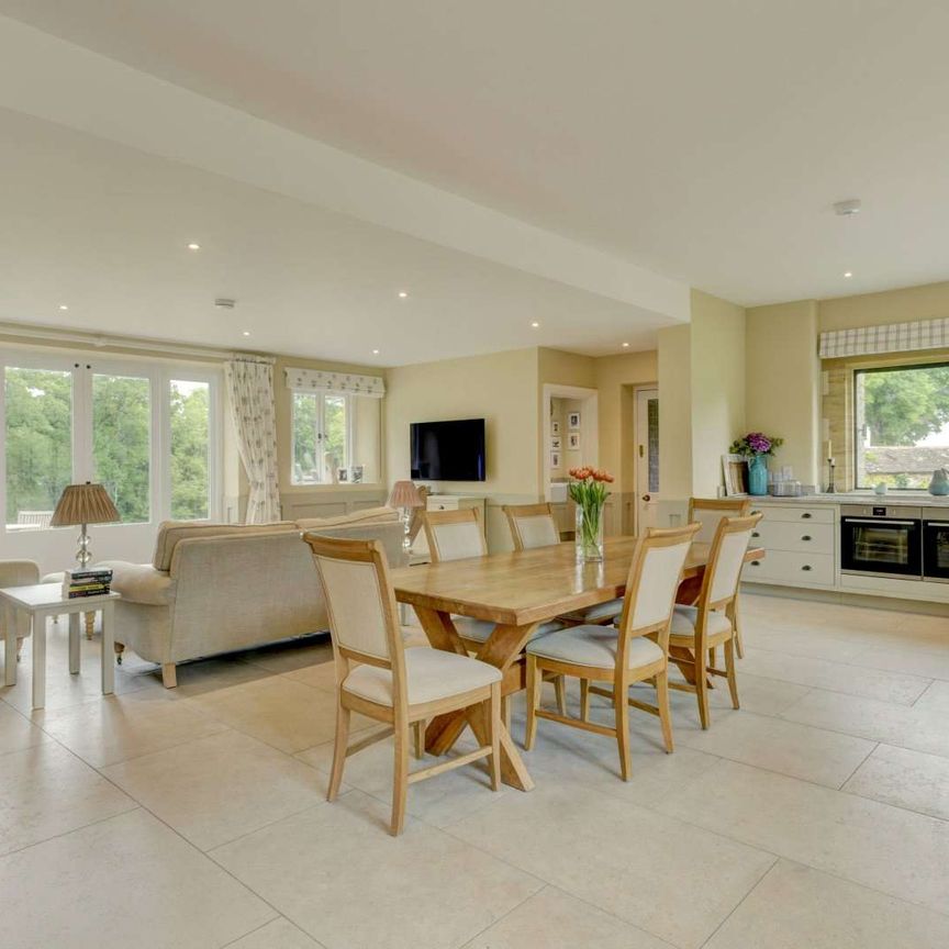 Beautifully refurbished family home of the highest quality, in an idyllic rural setting with far reaching views extensive secondary accommodation and about 14 acres. - Photo 1