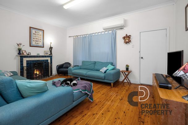 Central Home Packed with Positives! - Photo 1