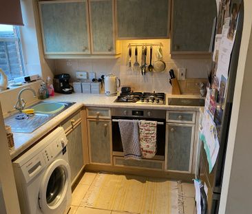 A two bedroom mid-terrace property with two double bedrooms, garage... - Photo 3