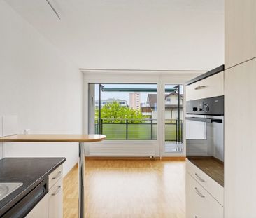 Familienfreundlich wohnen mit Sicht ins Grüne - Photo 4