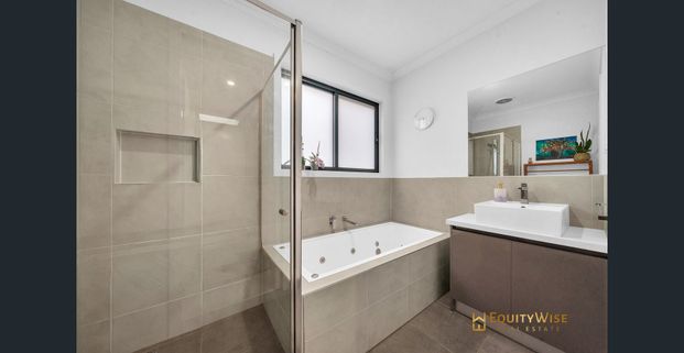 For Lease - Live Brightly in This 4-Bedroom Modern Retreat - Photo 1