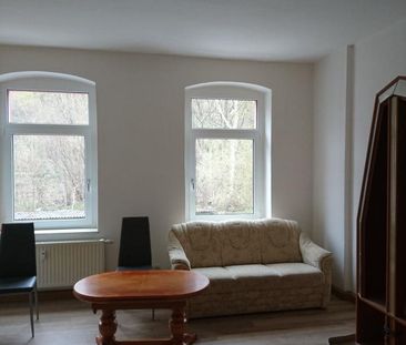 Grüne 2-Zimmer-Wohnung mit EBK - Foto 1