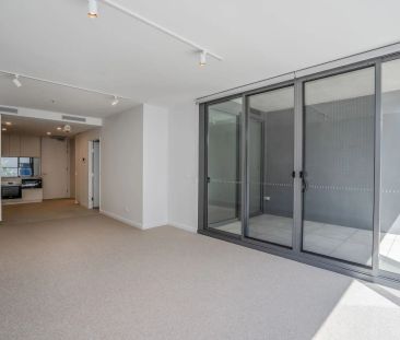 Experience Modern Living at the Prestigious "Seventy One" Complex - Photo 2