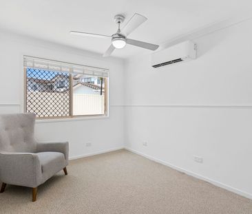 MODERN RENOVATED GEM WITH POOL AND FLEXIBLE LIVING SPACES - Photo 1