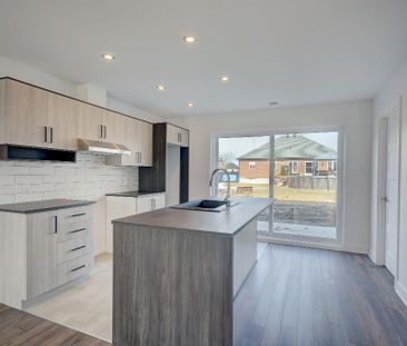 Superbe 5 ½ sur deux étages, style maison de ville! - Photo 3