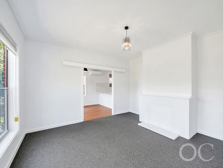 Open the door to coastal living with a sunlit deck retreat - Photo 4