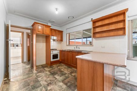 “Renovated Family Home with Secure Yard and Ample Parking” - Photo 5