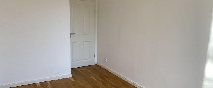 Erstbezug mit Balkon - Foto 1